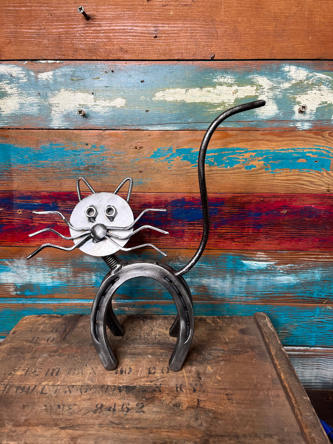 Horseshoe Cat repurposed art piece