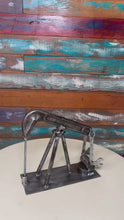 Load and play video in Gallery viewer, Oilfield Pump Jack welded reclaimed metals art piece handcrafted by Tammy Lee
